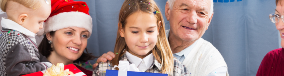 Photo of a family celebrating Christmas together | Featured Image for Ageing Parents and the Festive Season Page by Approved Finance.