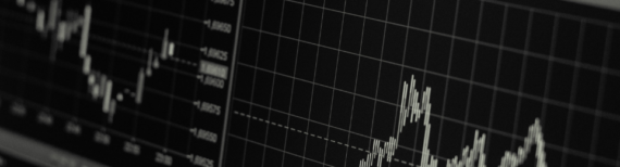 Financial graphs on a screen | Featured Image for Buffett's 2020 Performance Blog by Approved Finance.